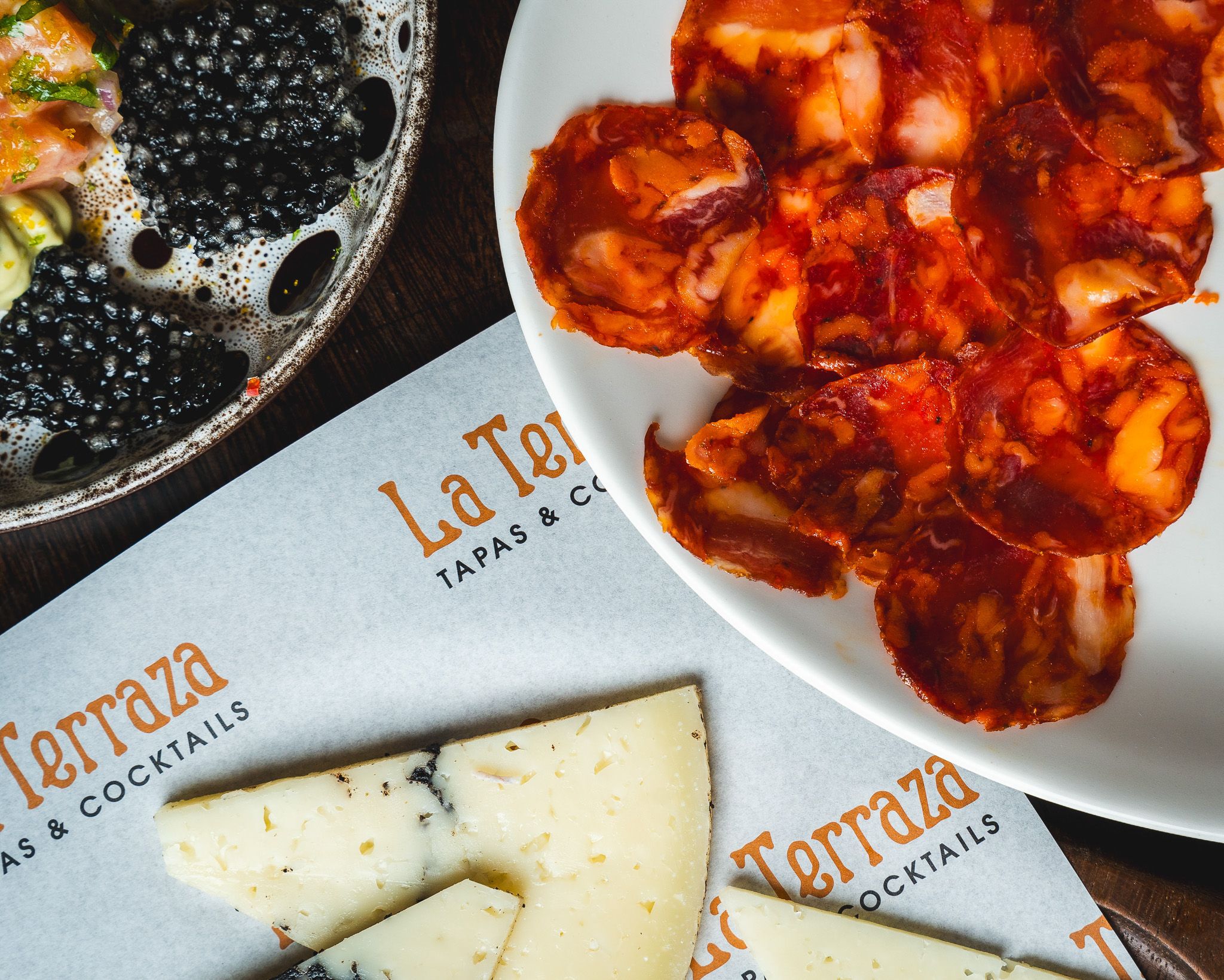 Generous sharing spread of cheese, chorizo and accompaniments